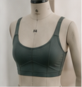 Olive activewear sample on a dress form